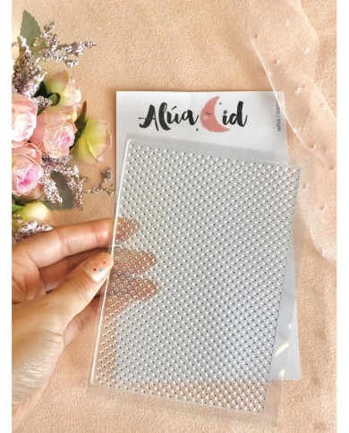 Sello fondo topitos de Alúa Cid